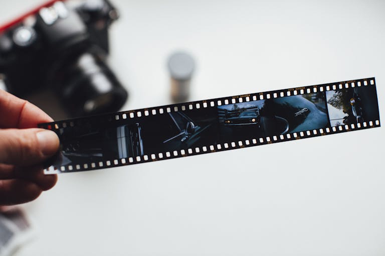 Person Holding Film Strip